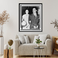 Julius and Ethel Rosenberg, half-length portrait, she facing front with her hand holding his arm, he facing left, handcuffed, Vintage Wall Art