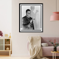 Historic Framed Print, [Louis Armstrong, half-length portrait, facing front, holding trumpet, as he appeared in Columbia Picture's Pennies from heaven"]",  17-7/8" x 21-7/8"
