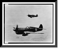 Aerial view of two P-40 single-engine fighter planes in flight, Antique Poster