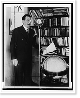 Historic Framed Print, [Floyd Gibbons, full-length portrait, standing behind NBC microphone, facing front],  17-7/8" x 21-7/8"