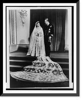 Queen Elizabeth II and Prince Philip, in wedding dress and dress military uniform, gaze at each other as they pose for a full-length wedding portrait, Vintage Poster