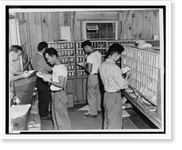 A view of one of the district post offices in a Japanese American detention facility, staffed by evacuees, Antique Print