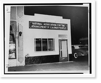 Exterior of newly appointed branch office of NAACP at 4272 South Central Ave., Los Angeles, California, at night with neon sign.Havies(?), L.A, Antique Print