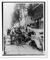 Parisians gather around a car and a home that were destroyed by German bombs, Antique Poster