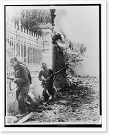 Two Canadian soldiers edge along wall, on the alert for German snipers, along road to Falaise, France, Antique Poster