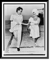 Elizabeth Taylor and Richard Burton full-length portrait, walking, after landing on the Mediterranean island of Ischia to shoot exterior scenes for Cleopatra"", Antique Poster