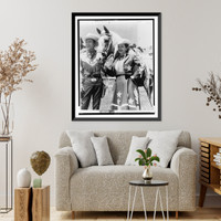Roy Rogers standing with wife Dale Evans and his horse Trigger, three quarter-length portrait, facing slightly left, Antique Poster