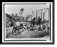 Historic Framed Print, [Vietnamese woman and children and American military advisor sit amid ruins of village in South Vietnam which was burned by government troops because it was thought to have been a Viet Cong stronghold],  17-7/8" x 21-7/8"
