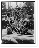 King Paul I and Queen Frederika of Greece, surrounded by falling ticker tape as they ride in car up Broadway to welcoming ceremony at City Hall, New York City, Historic Reproduction