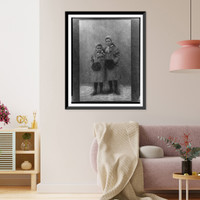 Anna and Sophie Freud, full-length portrait, standing, facing front, wearing coats and muffs.Dr. H. Heid, Wien, Vintage Print