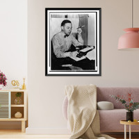 Tennessee Williams, half-length portrait, turned right, seated at typewriter, Antique Print