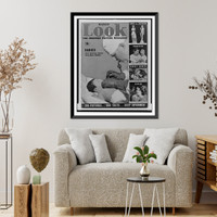 Historic Framed Print, [Look magazine cover illustration showing a doctor using a tracheal catheter to clear infant's lungs after birth],  17-7/8" x 21-7/8"