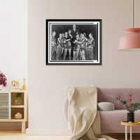 Kentucky Wildcats basketball team hoist Coach Adolph Rupp on their shoulders after winning the National Invitation Basketball Tourney in Madison Square Garden, New York City Vintage Wall Art Prin