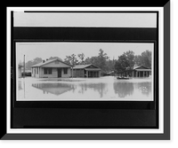 Flood waters up to the door of several houses.Ewing, Inc., Baton Rouge, Antique Print