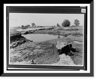 Floodwaters receding leaving misshapen landform.Ewing, Inc, Historic Reproduction