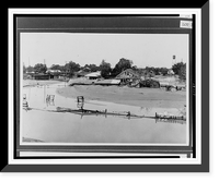 Silt and damaged property remain as floodwaters retreat.Ewing, Inc, Historic Print