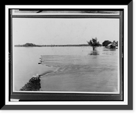 Floodwater covering vast area submerging vegetation and damaged building.Ewing, Inc, Historic Print