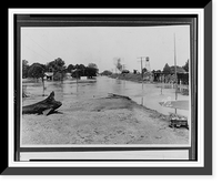 Floodwaters partially submerging Melville, Louisiana, while elevated railroad tracks remain dry.Ewing, Inc, Antique Poster