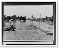 Floodwaters partially submerging Melville, Louisiana, while elevated railroad tracks remain dry.Ewing, Inc, Antique Poster