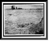 Torrential floodwaters submerging all in its path, trees in background, Vintage Wall Art
