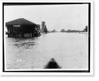 Odenburg depot station partially submerged by floodwaters, people stranded on right, Antique Print