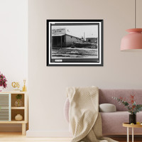 Historic Framed Print, [Grocery store and other buildings with flood damage, dirt mounded on right].Ewing, Inc., Baton Rouge, La.,  17-7/8" x 21-7/8"