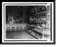 Historic Framed Print, [Interior of People's Drug Store, 14th and Park Streets, Washington, D.C., with employee behind soda fountain and another employee behind counter with product display],  17-7/8" x 21-7/8"