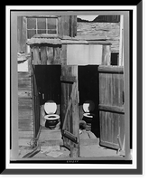 Toilets in court of houses in Mexican section. Cannery workers as well as some agricultural workers and unskilled laborers live in this section, Historic Reproduction