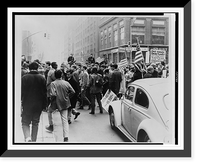 Demonstrators, marching in a downtown area, with flags and placards in support of the war in Vietnam, police on horseback in background.World Journal Tribune photo by Matthew Black. Timeless Wall
