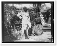 Barbara Hutton seated, with her husband Porfirio Rubirosa standing beside her, on steps outside house, Historic Reproduction