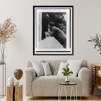 Man, half-length portrait, standing, facing left, leaning elbows on wall Classic, Antique Wall Art