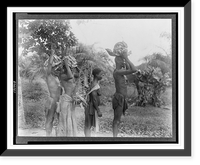African men and woman arriving at the monthly wild rubber village market, carrying rubber and supplies, Lebango, Moyen Congo.photo by Brazzaville Bureau, OWI, Historic Print