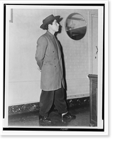 Frank Tellez, full-length portrait, standing, facing right, wearing hat and zoot suit, Historic Reproduction