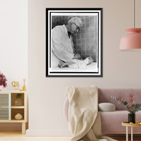 Historic Framed Print, Dr. Virginia Apgar welcoming world's newest guest.World Journal Tribune photo by Al Ravenna.,  17-7/8" x 21-7/8"