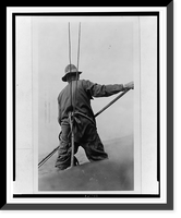 Man, secured by ropes, with back to camera, holding pole, body of water in background Classic, Antique Print