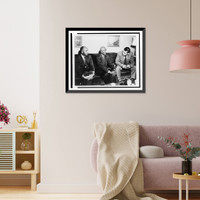 Two unidentified African American men seated on a sofa, talking to a young man, possibly a reporter Classic, Antique Wall Art