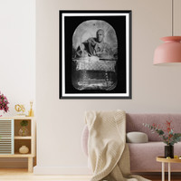 World War I soldier, half-length portrait, seated, facing front, with two hats on table Classic, Vintage Poster