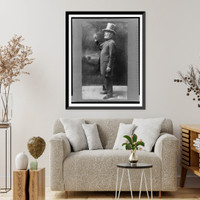 Joseph Cannon, full-length portrait, standing, facing right, wearing top hat and holding up cigar, Antique Wall Art