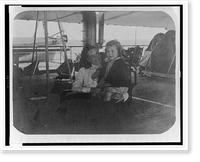 Helen Herron Taft(?) holding her daughter Helen, seated on deck of ship, Antique Print