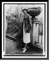 Historic Framed Print, [Margaret Sanger, full-length portrait, standing by fence, facing front].Underwood & Underwood.,  17-7/8" x 21-7/8"