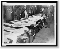 Black & White Photo - Fire victims being identified by relatives