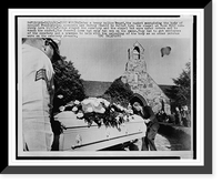Under a heavy police guard, the casket containing the body of accused Presidential assassin Lee Harvey Oswald is rolled into the chapel at Rose Hill cemetery here Forth Worth 11/25 Heritage Wall