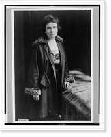 Miss Anne Martin, three-quarter length portrait, standing, facing front, wearing coat, Antique Poster