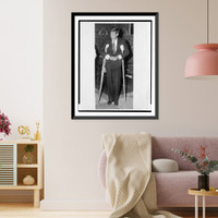 Historic Framed Print, [John F. Kennedy, full-length portrait, standing with crutches, facing slightly left],  17-7/8" x 21-7/8"