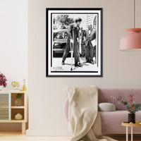 Historic Framed Print, [President John F. Kennedy on crutches accompanied by White House Press Secretary Andrew T. Hatcher on way to a conference in Washington, D.C.],  17-7/8" x 21-7/8"