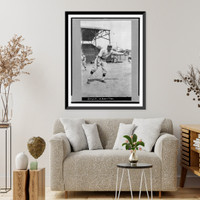 Historic Framed Print, [Alvin, i.e., Albert James Cozy" Dolan,  St. Louis Cardinals baseball player,  facing front,  standing,  wearing uniform,  in position to catch thrown baseball]",  17-7/8" x 21-7/8"