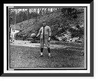 Historic Framed Print, [Ed Konetchy, baseball player with the Pittsburgh Pirates, standing, while holding a basketball],  17-7/8" x 21-7/8"