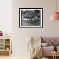 Historic Framed Print, [Ed Konetchy, baseball player with the Pittsburgh Pirates, standing, while holding a basketball],  17-7/8" x 21-7/8"