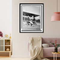 Historic Framed Print, [Frank Gilhooley, baseball player with the New York Yankees, swings his bat at home plate],  17-7/8" x 21-7/8"