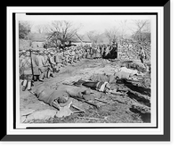 Historic Framed Print, [Chinese nationalist soldiers heading to the Su Zhou front, wounded soldiers returning from battle, and other casualties lying on stretchers in the foreground],  17-7/8" x 21-7/8"